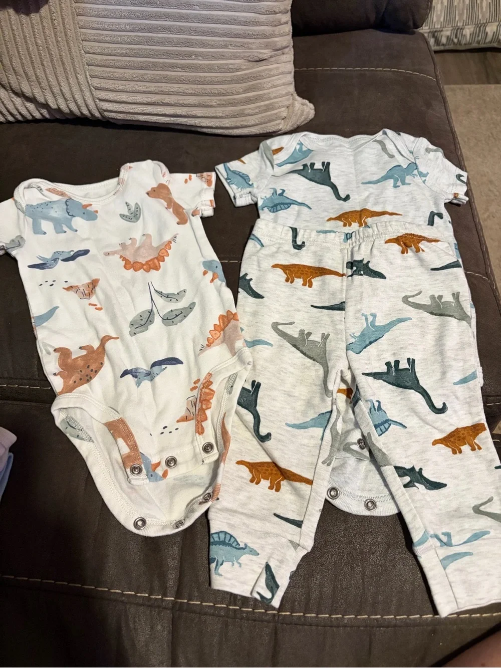 Carter's White Baby Bodysuit with Blue, Green and Rust Dino Print